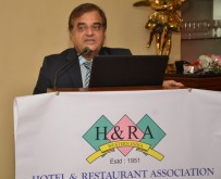 Mr. Anil Harish addresses the seminar organised by HRAWI